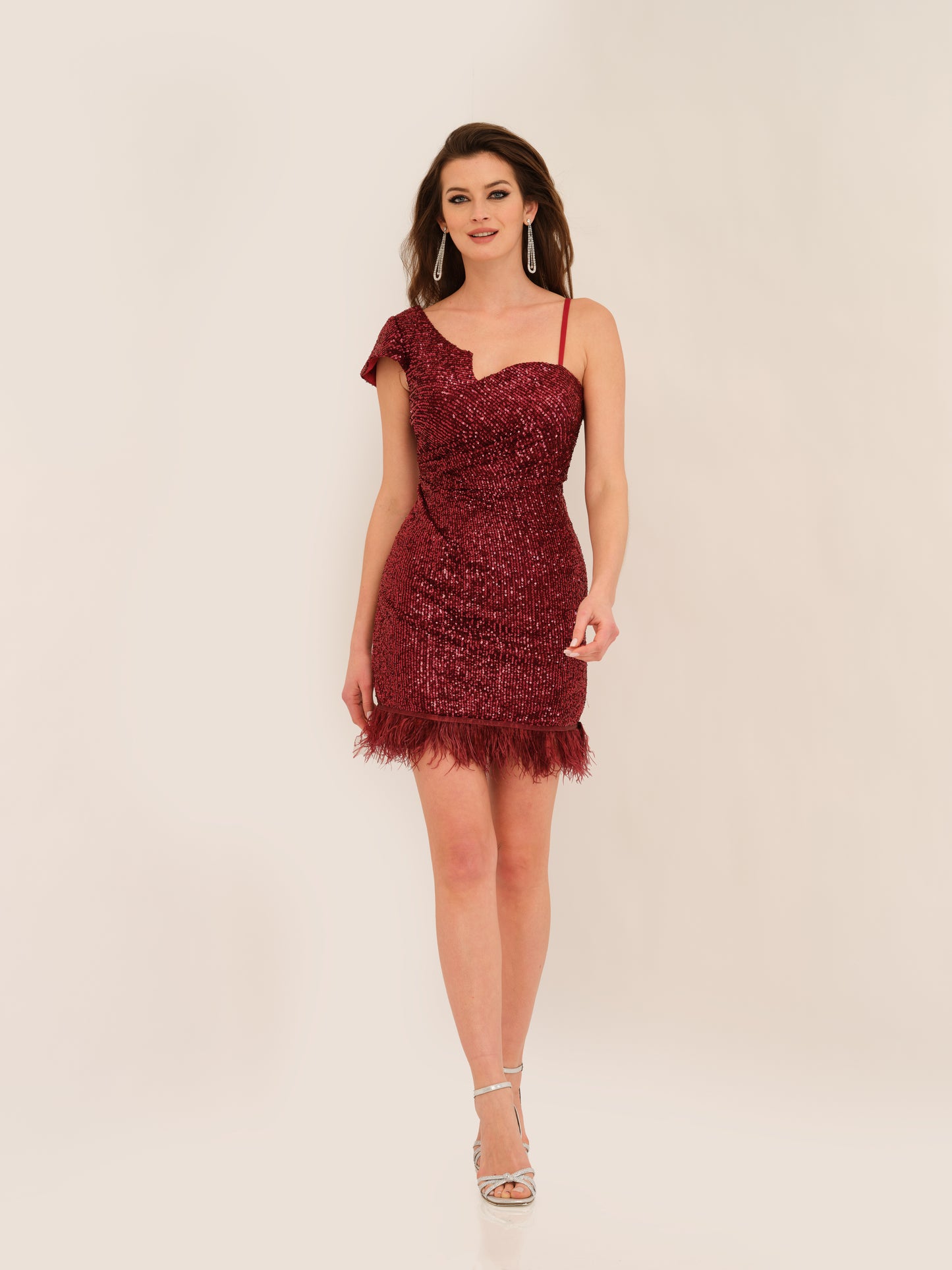 ASYMMETRICAL FEATHERED CUT OUT GOWN